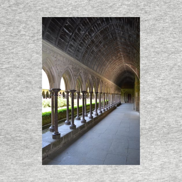 A long hallway open to the garden at Mont Saint-Michel - the castle inspiration for Tangled by tziggles